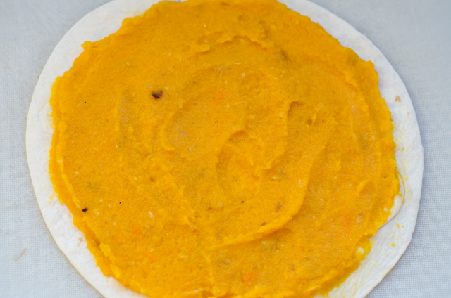 Spread the puree evenly over four tortillas to about a quarter inch from the edges.